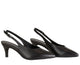 A pair of black leather slingback pumps with pointed toes and kitten heels, displayed on a clean white reflective surface.