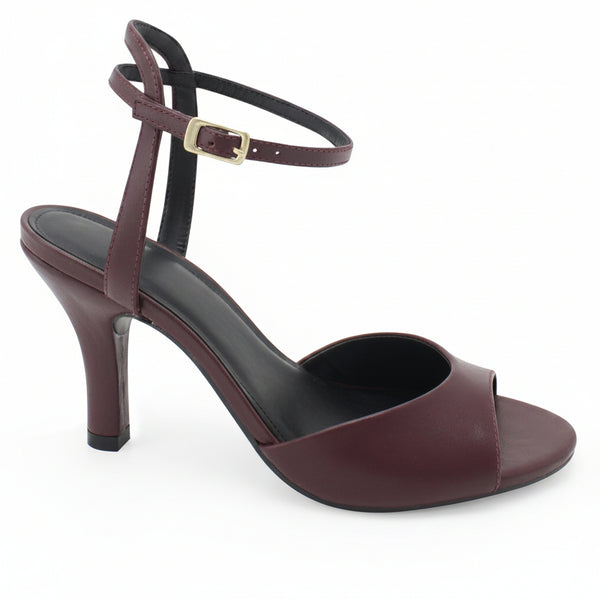 A single burgundy leather high-heeled sandal with an ankle strap and gold buckle, shown from a side profile on a white background.