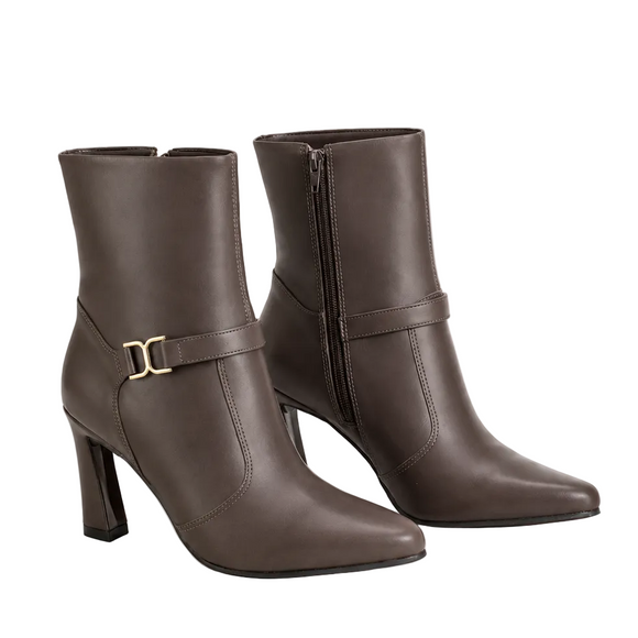 A pair of dark brown leather ankle boots with pointed toes, block heels, side zippers, and a decorative strap with a gold buckle on the outer side, shown against a plain white background.