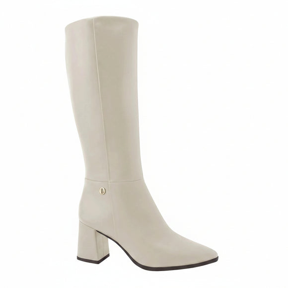 A light beige knee-high leather boot with a block heel and a small gold-tone logo detail on the side, shown against a plain white background with a 'Genuine Leather' emblem in the top right corner.