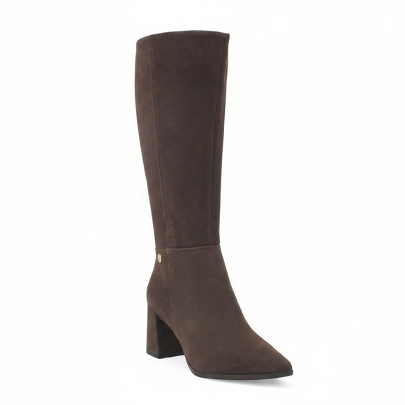 A black knee-high suede boot with a block heel and a small gold button accent near the ankle, shown on a white background with a 'Genuine Leather' graphic in the top right corner.