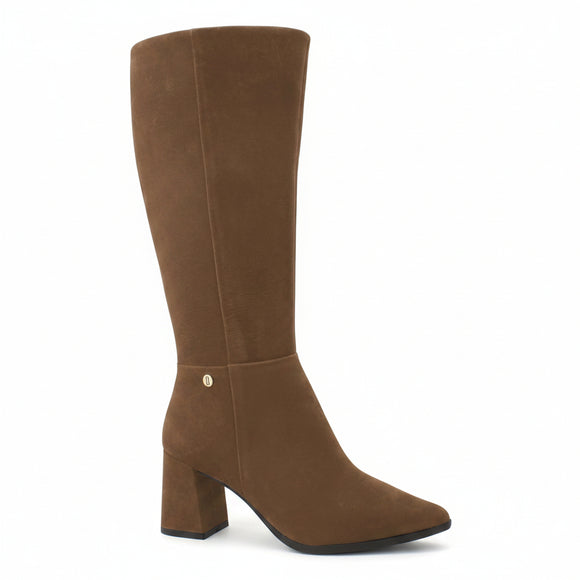 A black knee-high suede boot with a block heel and a small gold button accent near the ankle, shown on a white background with a 'Genuine Leather' graphic in the top right corner.