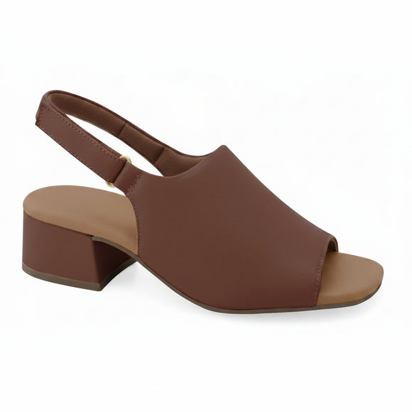 A brown leather slingback sandal with a low block heel and open toe, shown from a side profile on a white background with a 'Genuine Leather' badge in the top right.