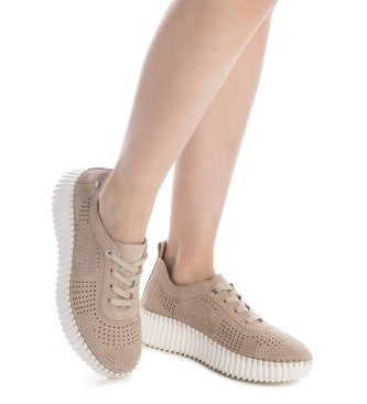 Bring comfort and style together with the Carmela Lasercut Suede Sneaker – Model 162325