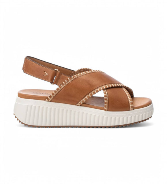 Elevate your summer style with the Carmela Leather Wedge Sandal from myshoeshop.co.za