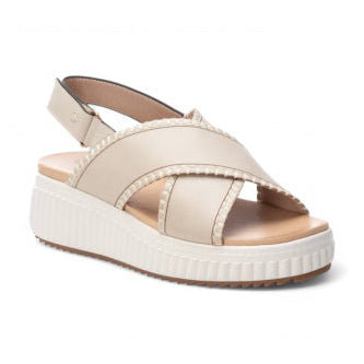 Elevate your summer style with the Carmela Leather Wedge Sandal with Stitch Detail from myshoeshop.co.za