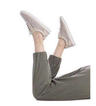 Refresh your everyday look with the Carmela Lasercut Leather Sneaker – Model 162327 form Myshoeshop.co.za