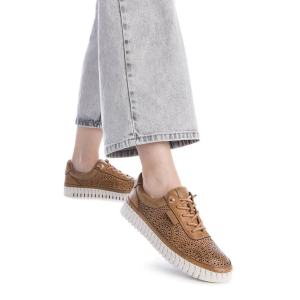 Refresh your everyday look with the Carmela Lasercut Leather Sneaker – Model 162327 form Myshoeshop.co.za