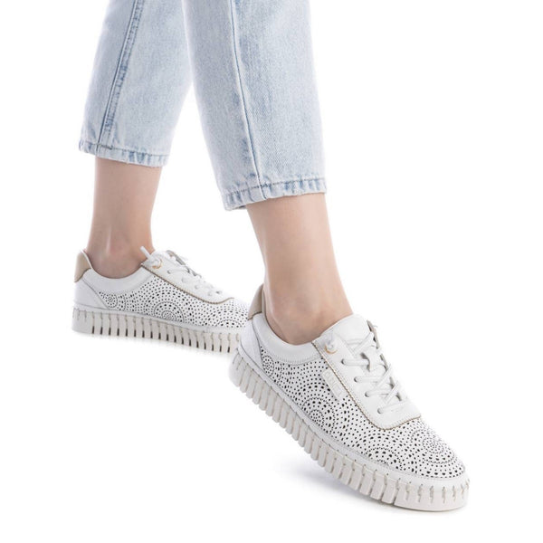 Refresh your everyday look with the Carmela Lasercut Leather Sneaker – Model 162327 form Myshoeshop.co.za