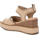 Step into effortless style and comfort with the Carmela Leather Wedge Sandal from Myshoeshop.co.za