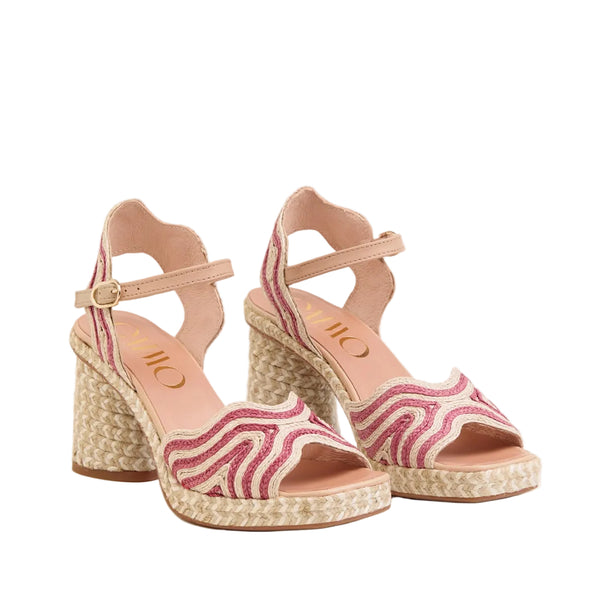 A pair of women's espadrille-style block-heel sandals with woven jute platforms and heels, featuring pink and white wavy patterned straps, shown on a light beige background.