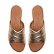 Inuovo 123027 gold laminated-effect leather slip-on wedge sandal with criss-cross upper and leather lining.