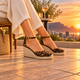 Gaimo Hester leopard print wedge espadrilles worn at sunset