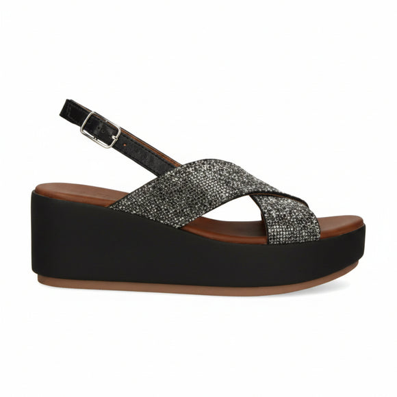 Inuovo 123005 black leather wedge sandal with miniature diamante detailing and adjustable ankle strap.